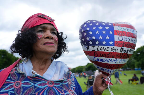 Shelia Clay arriving for the watch party at the Midway Plaisance Park for the dedication ceremony for the Obama Presidential Center, Thursday, June 18, 2026, in Chicago. (AP Photo/Nam Y. Huh)