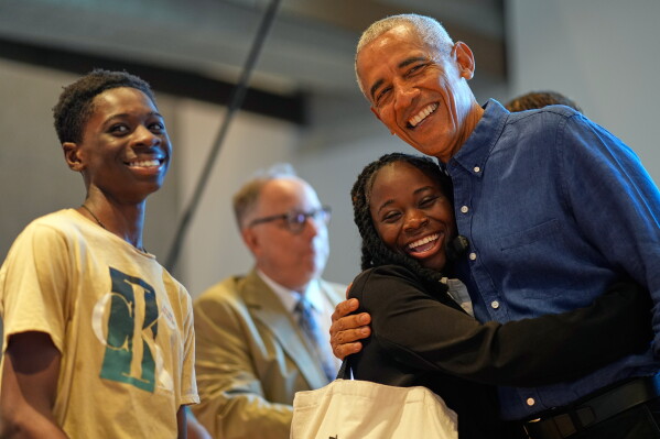 Former President Barack Obama greets the first group of visitors at the official opening of the Obama Presidential Center in Chicago, Friday, June 19, 2026. (AP Photo/Pablo Martinez Monsivais, Pool)