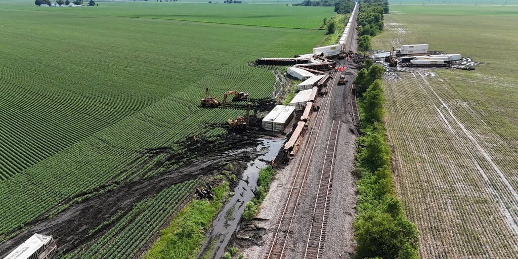 Watch: Double-stack train cars toppled by vicious winds in Illinois