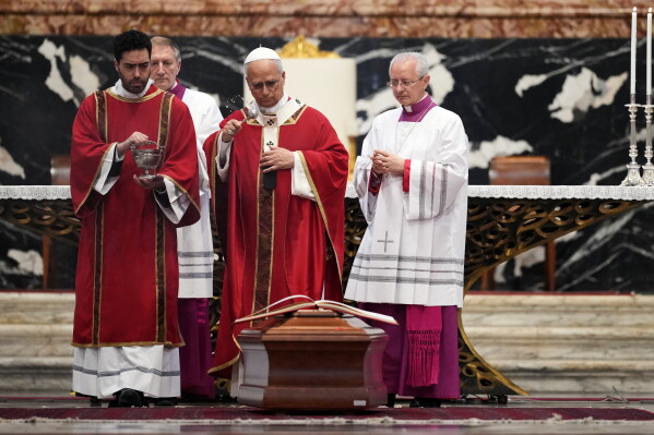 Pope Leo XIV celebrates the funeral service for late Cardinal Camillo Ruini, in St.Peter's Basilica at the Vatican, Thursday, June 18, 2026. (AP Photo/Andrew Medichini)
