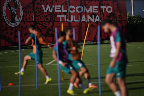 Players for Iran participate in a training session ahead of their team's World Cup Group G soccer match against Belgium Tuesday, June 16, 2026, in Tijuana, Mexico. (AP Photo/Gregory Bull)
