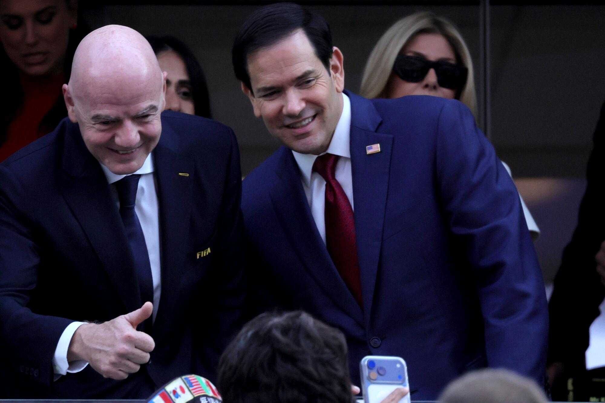 FIFA president Gianni Infantino, left, and U.S. Secretary of State Marco Rubio pose for a photo.