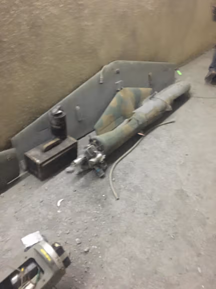 An attack drone and related equipment inside a tunnel that the Israeli military says was designed and financed by Iran for Hezbollah in Majdal Zoun, southern Lebanon. Israeli officials said the underground facility was used to store and launch UAVs toward Israel.