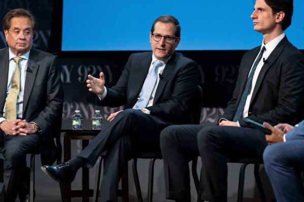 Micah Lasher, center, democratic candidate in New York's 12th Congressional District, speaks during "NY-12 for Congress: Candidate Forum" at 92NY, Wednesday, April 15, 2026, in New York. (AP Photo/Yuki Iwamura,File)