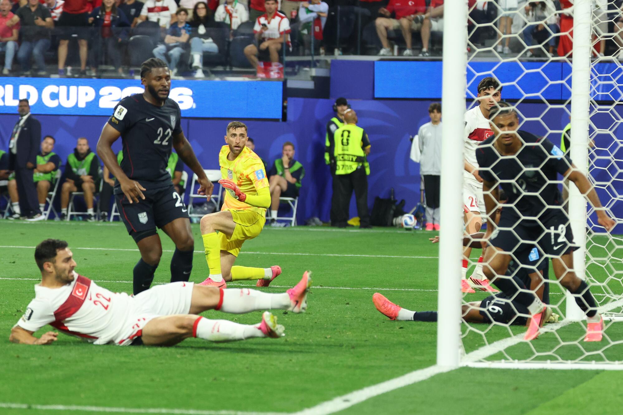 Turkey's Kaan Ayhan scores the winning goal in stoppage time, sending the U.S. to a 3-2 loss at the World Cup on Thursday.