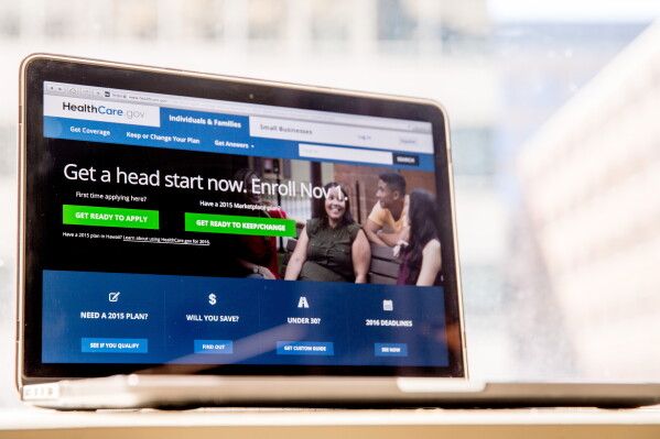The HealthCare.gov website, where people can buy health insurance, is displayed on a laptop screen in Washington, Oct. 6, 2015. (AP Photo/Andrew Harnik, File)