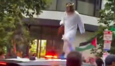 Trans March Participant Dressed as Jesus Climbs SFPD Patrol Car as Police Clash With Marchers
