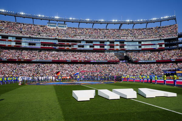 Players stand for the national anthem before the World Cup round of 32 soccer match between Germany and Paraguay in Foxborough, Mass., near Boston, Monday, June 29, 2026. (AP Photo/Martin Meissner)