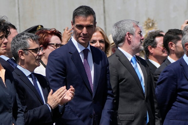 Spain's Prime Minister Pedro Sanchez attends Pope Leo XIV's meeting with organisations working with migrants in Arguineguin at the Canary Islands, Spain, Thursday, June 11, 2026. (AP Photo/Alessandra Tarantino)