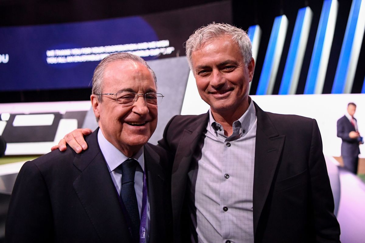 Real Madrid's president Florentino Perez (L) poses for a picture with Portuguese football manager Jose Mourinho at the 69th FIFA Congress at Paris Expo, Porte de Versailles in Paris