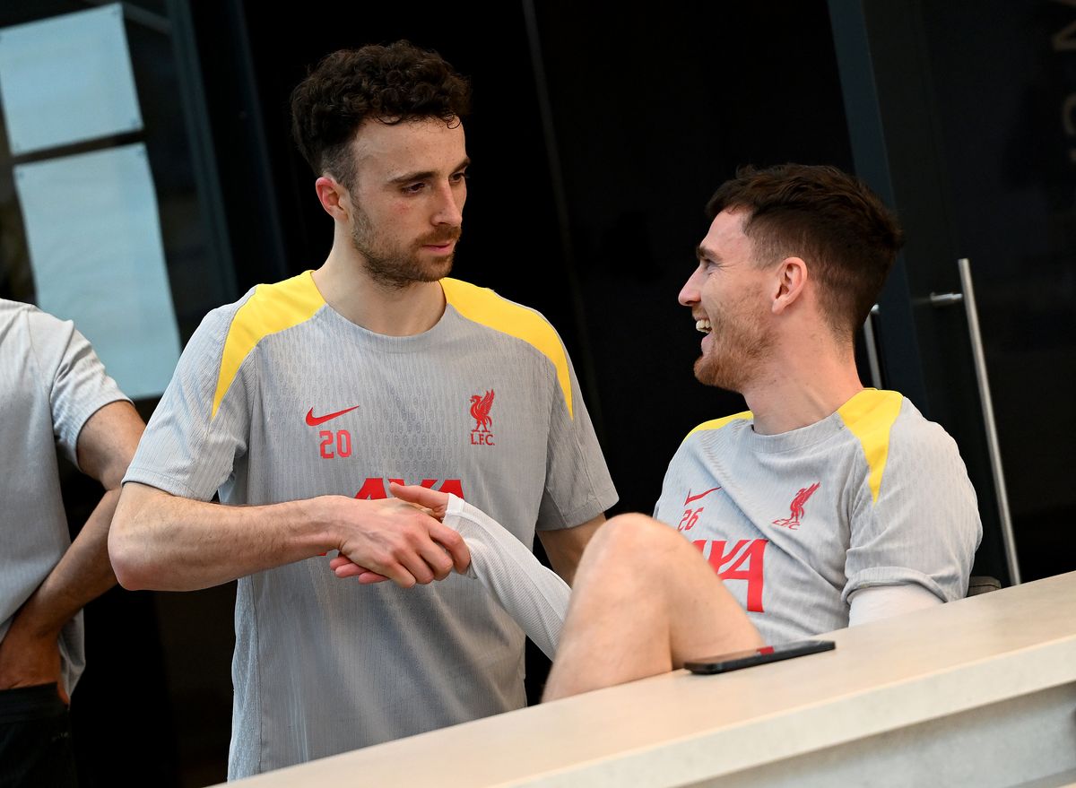 LIVERPOOL, ENGLAND - JANUARY 28: (THE SUN OUT, THE SUN ON SUNDAY OUT) Diogo Jota and Andrew Robertson of Liverpool during a training session during the UEFA Champions League 2024/25 League Phase MD8 training and press conference at AXA Melwood Training Centre on January 28, 2025 in Liverpool, England. (Photo by Nick Taylor/Liverpool FC/Liverpool FC via Getty Images)