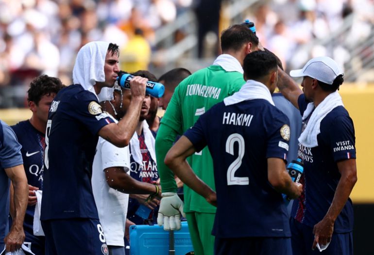 Soccer Football - FIFA Club World Cup - Semi Final - Paris St Germain v Real Madrid - MetLife Stadium, East Rutherford, New Jersey, U.S. - July 9, 2025 Paris St Germain's Fabian Ruiz during a hydration break REUTERS/Kai Pfaffenbach
