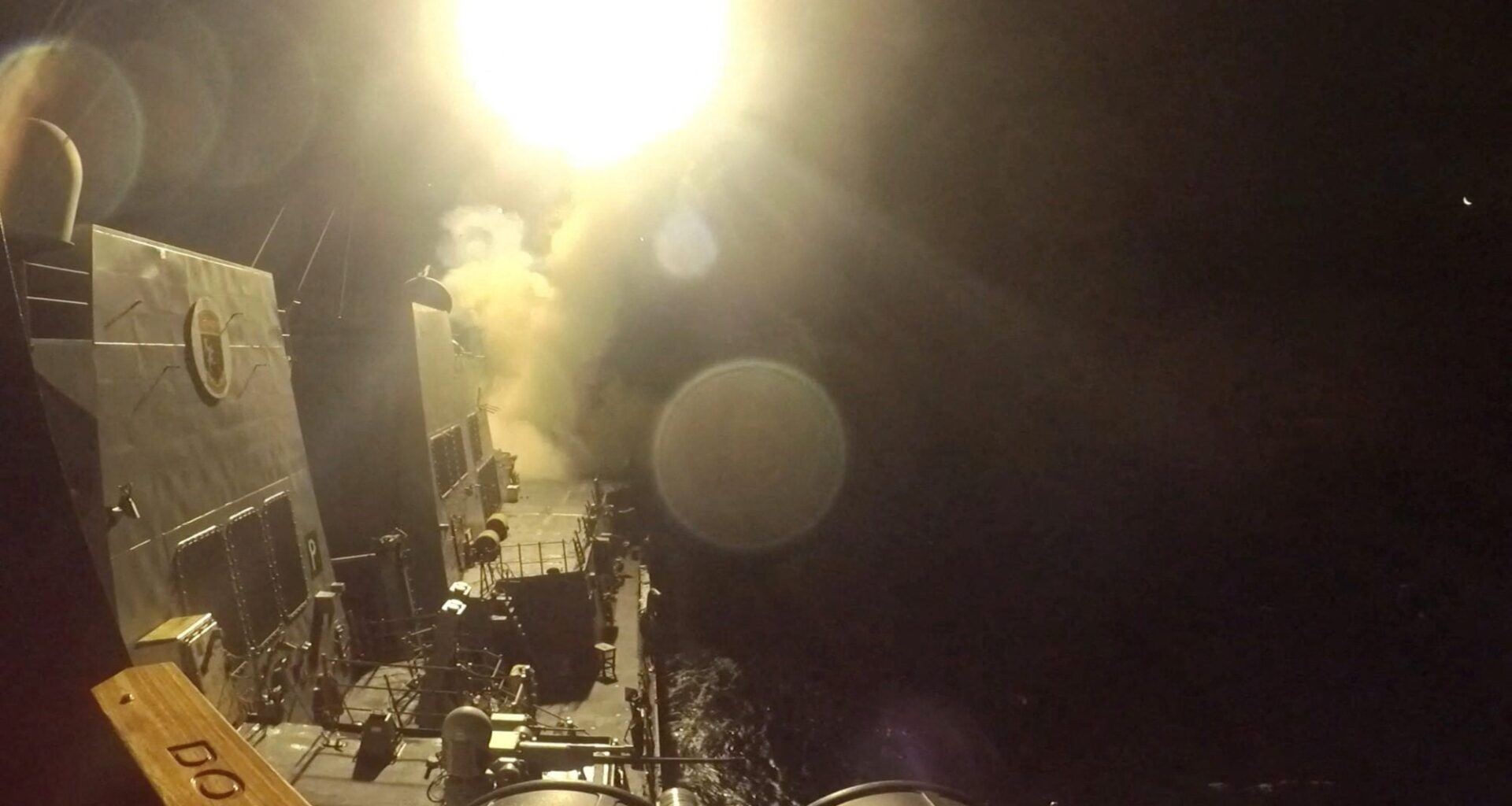 USS Michael Murphy (DDG 112) launches Tomahawk cruise missiles from an unknown location, as the United States launched new strikes against multiple targets overnight in Iran, the U.S. military said on Wednesday, in this still image obtained from a handout video