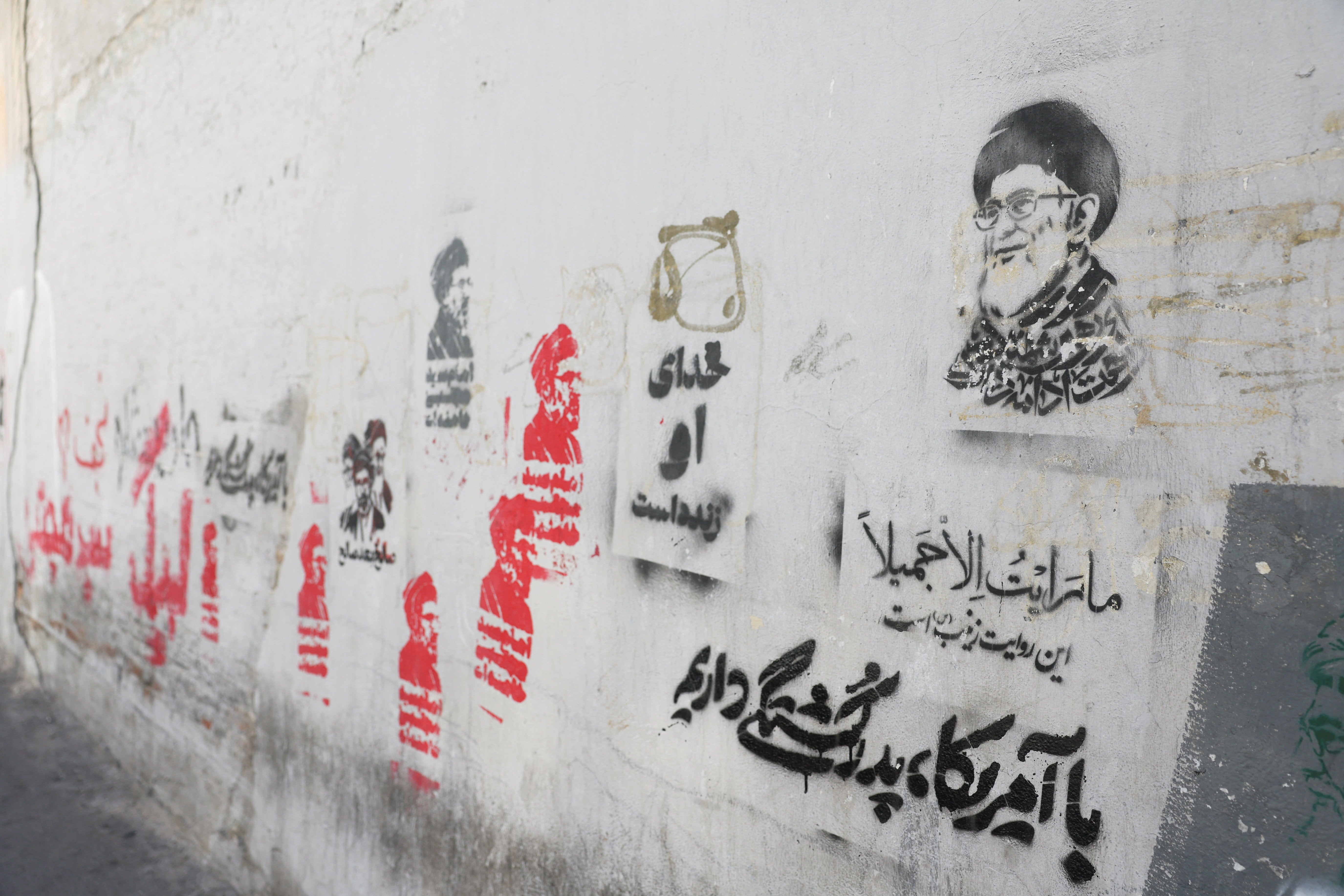 Graffiti of late Iranian Supreme Leader Ayatollah Ali Khamenei, after U.S. and Iranian officials said they had reached a deal to end their war and reopen the Strait of Hormuz