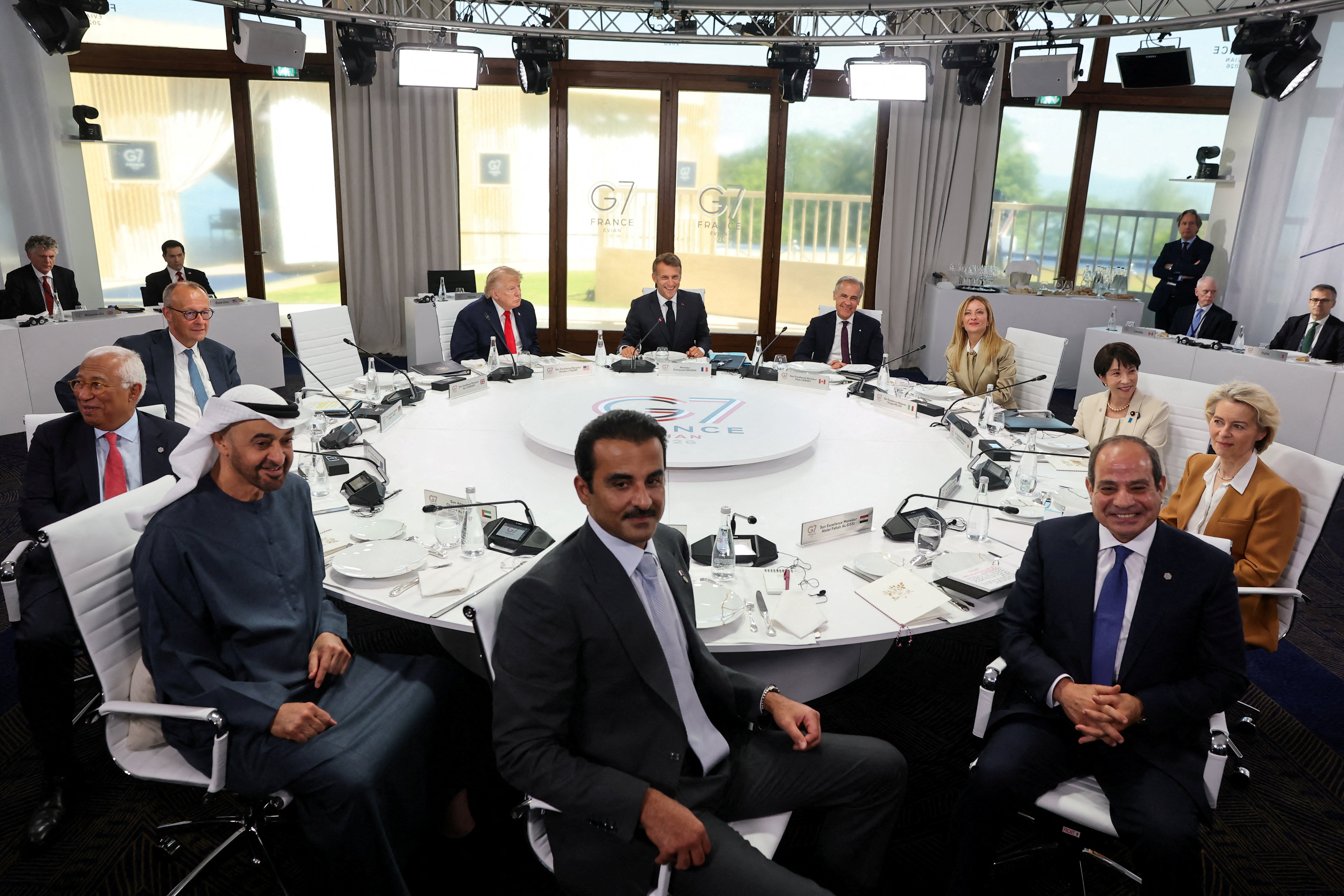 Takaichi, Merz, Meloni, Trump, Von der Leyen, Carney, Costa and Macron, alongside the emir of Qatar Sheikh Tamim bin Hamad Al Thani, president of the UAE Sheikh Mohamed bin Zayed Al Nahyan and Egyptian president Abdel Fattah al-Sisi