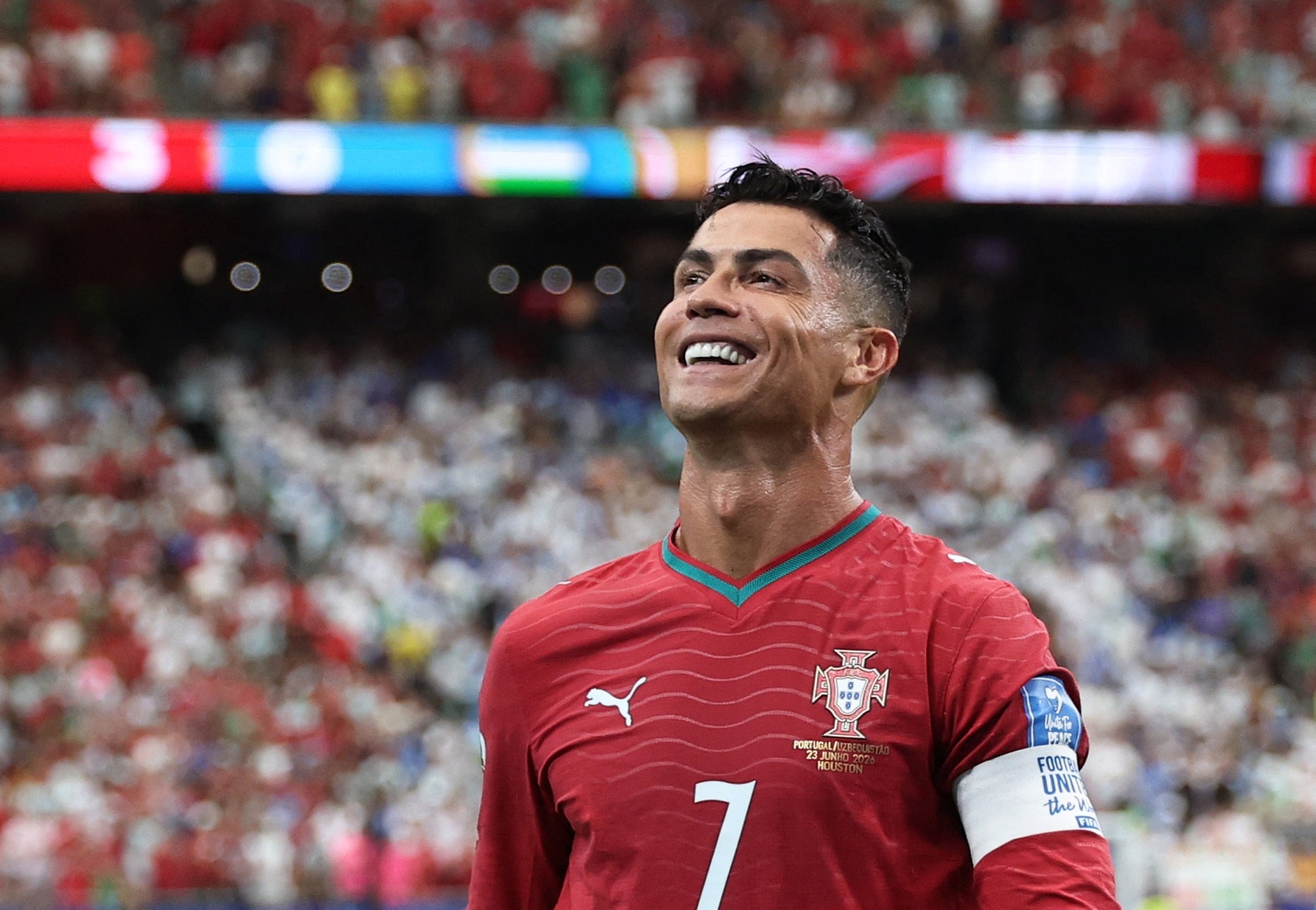Cristiano Ronaldo celebrates after scoring Portugal's third goal against Uzbekistan