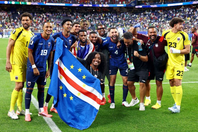 Soccer Football - FIFA World Cup 2026 - Group H - Cape Verde v Saudi Arabia - Houston Stadium, Houston, Texas, U.S. - June 26, 2026 Cape Verde players and staff celebrate after the match as Cape Verde qualify for the knockout stages of the World Cup REUTERS/Phil Noble TPX IMAGES OF THE DAY