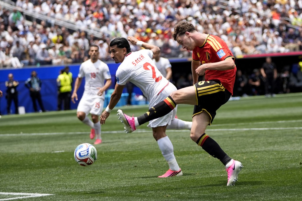 Saleh Hardani 2, of Iran in action againstMaxim De Cuyper 5, of Belgium during the 2026 FIFA World Cup First Stage Group G match between IR Iran and Belgium at the Los Angeles Stadium (SoFi Stadium) in Inglewood, California, United States on June 21, 2026.