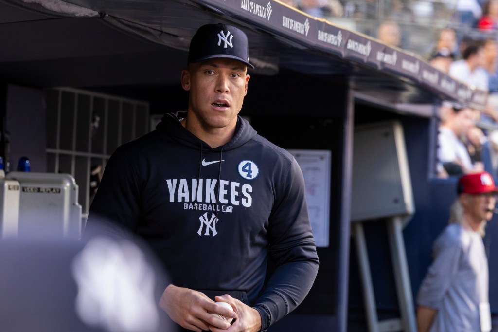New York Yankees right fielder Aaron Judge (99) looks on in the dugout in the fourth inning against the Cleveland Guardians at Yankee Stadium, Tuesday, June 2, 2026, in Bronx, NY. 