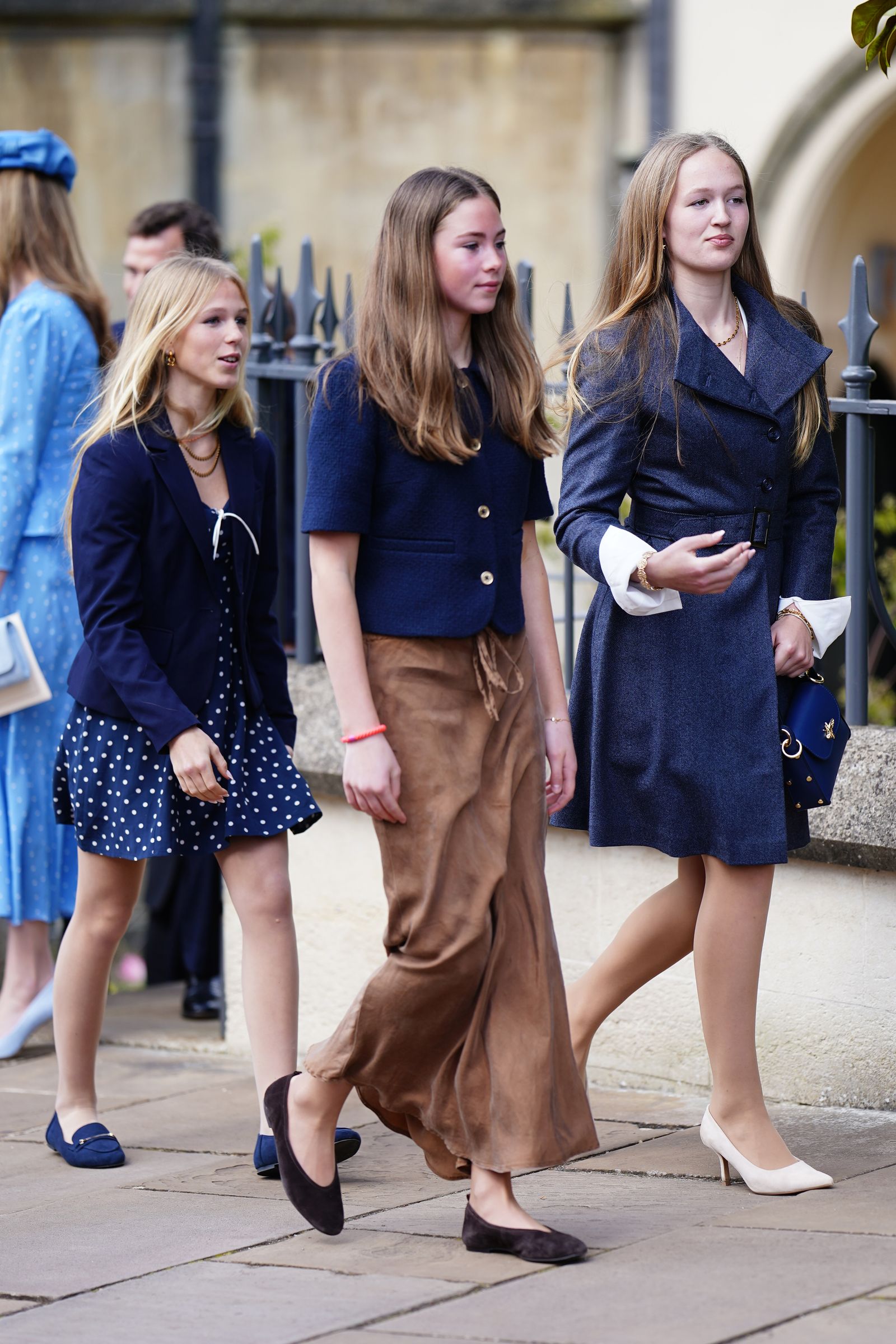 Image may contain Rosanna Munter Clothing Skirt Coat Adult Person Brown Hair and Hair