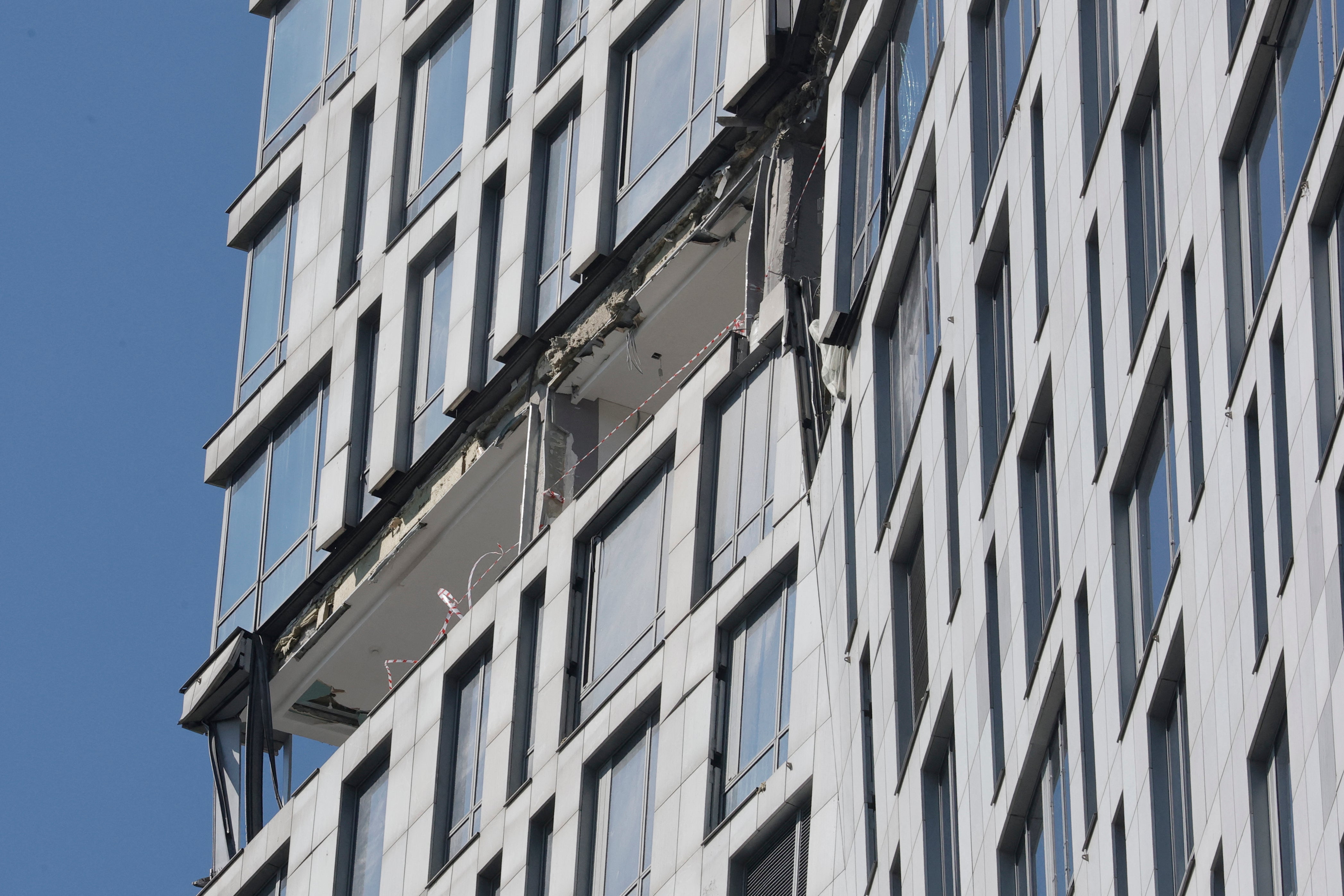 A view shows damage to a high-rise residential building following a drone attack in Moscow