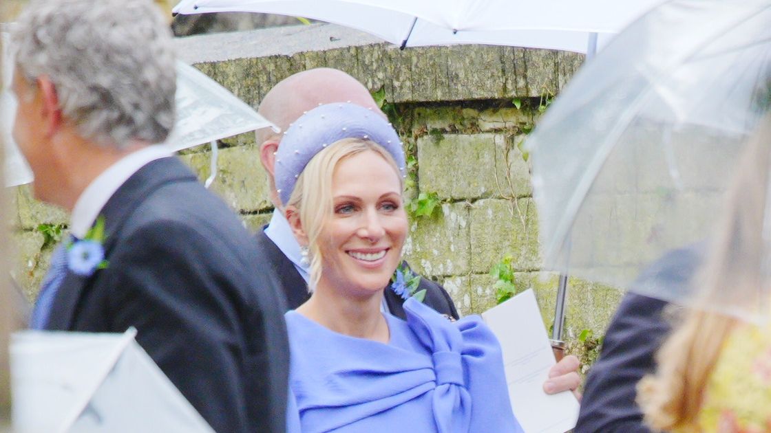 Something blue! Zara Tindall rewears a periwinkle dress from her favourite brand for brother Peter Phillips' wedding to Harriet Sperling