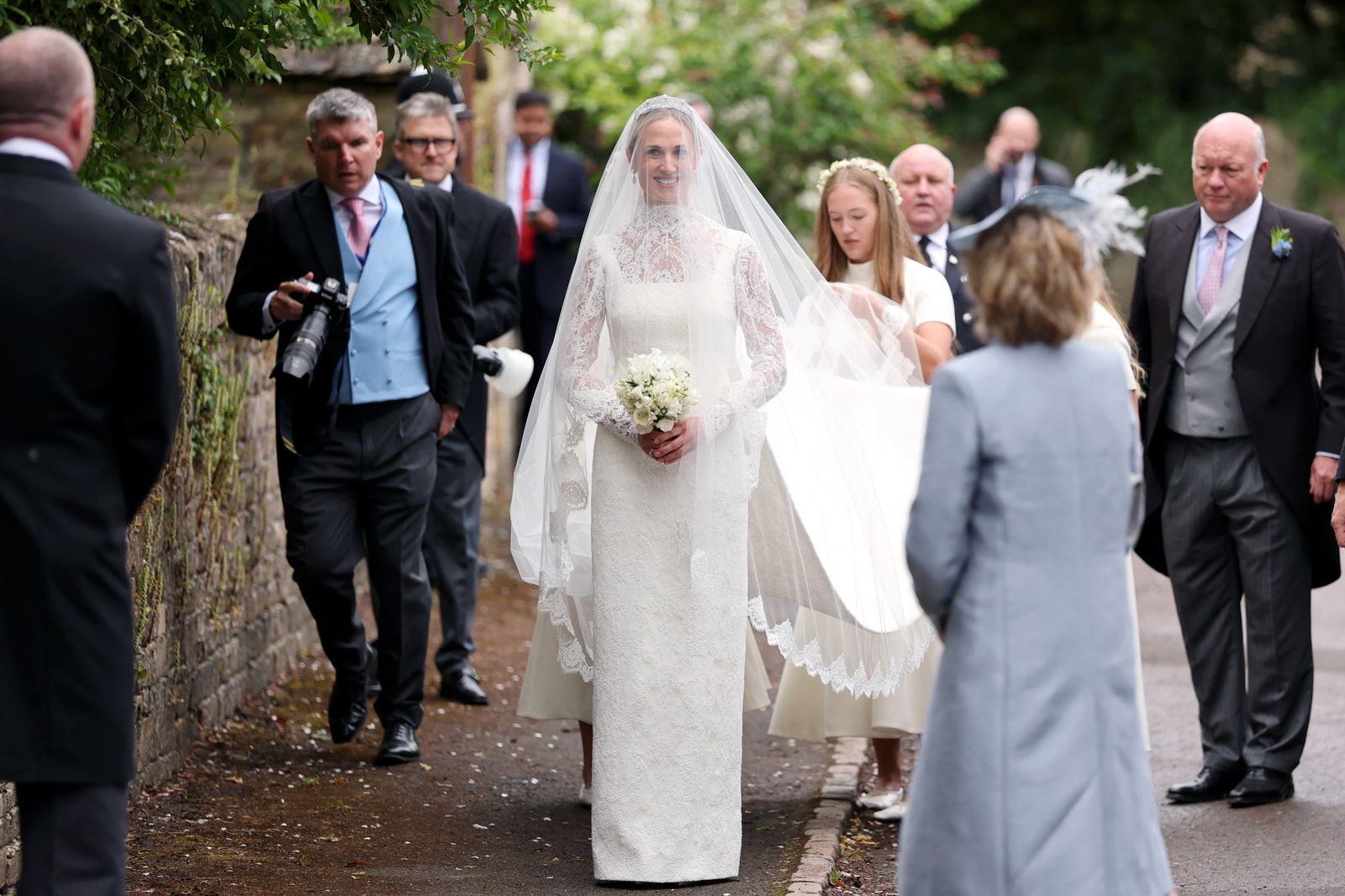 Image may contain Catherine Garceau Ljubo Ćesić Rojs Adult Person Wedding Clothing Dress Fashion and Formal Wear