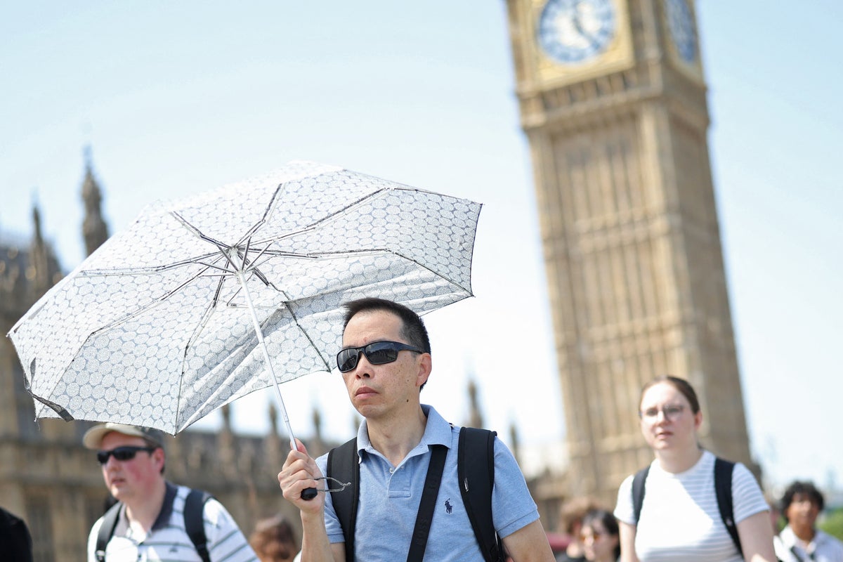 UK heatwave live: School closures and travel chaos hit Britain with extreme red weather warning to begin