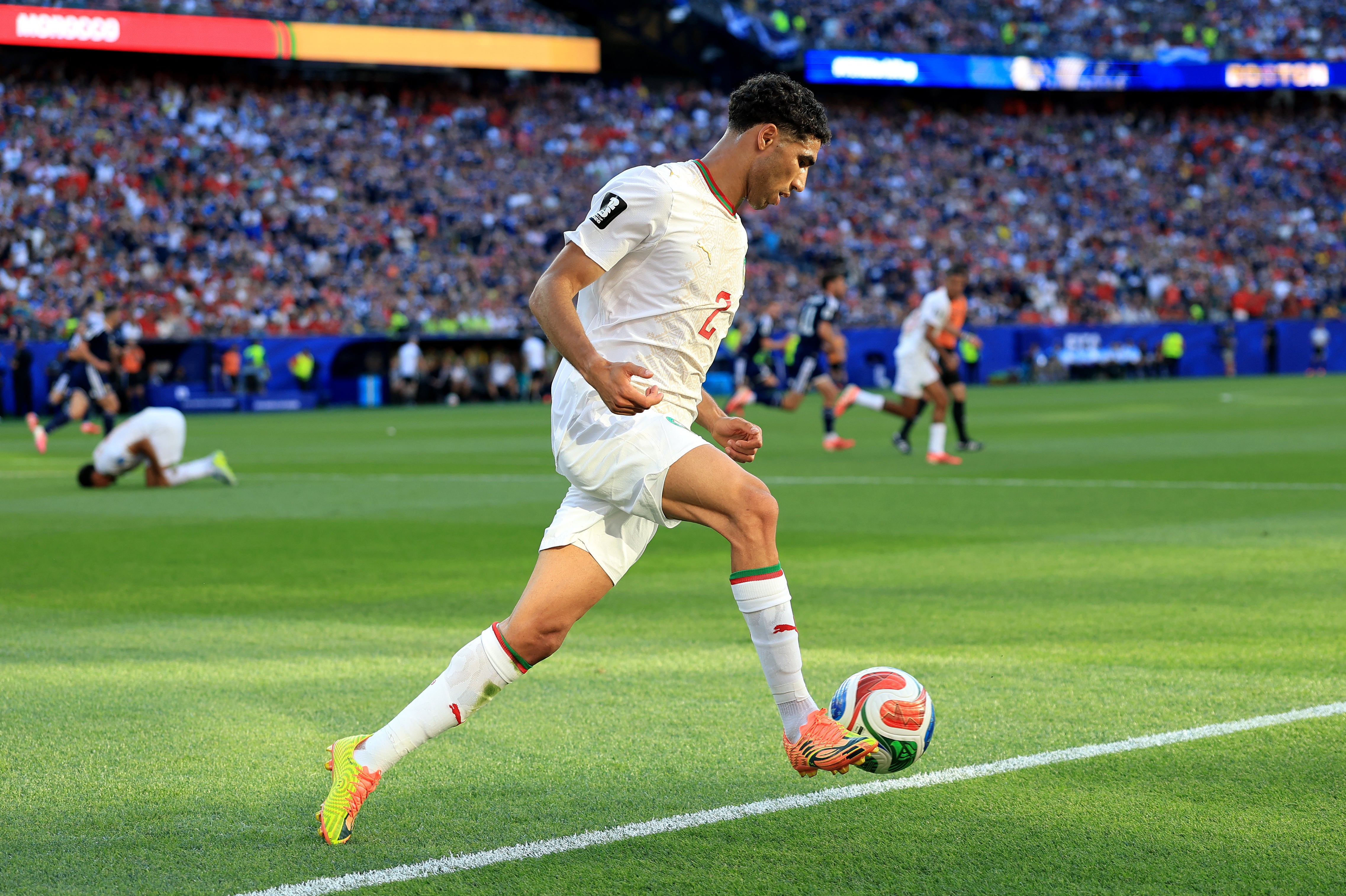 Achraf Hakimi in action against Scotland during the World Cup