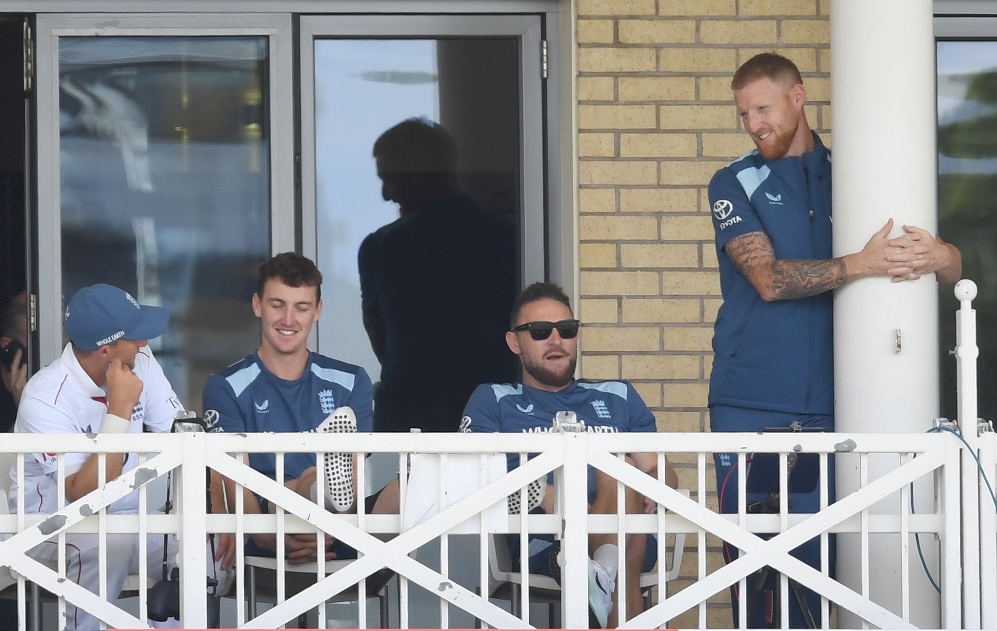 Ben Stokes, Brendon McCullum, Harry Brook and Joe Root of England on the dressing room balcony