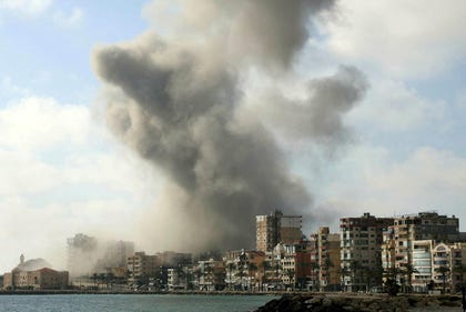 Smoke rises from the site of an Israeli airstrike that targeted a neighborhood in the southern Lebanese coastal city of Tyre on Sunday. Credit: AFP/KAWNAT HAJU Smoke rises from the site of an Israeli airstrike that targeted a neighborhood in the southern Lebanese coastal city of Tyre on Sunday.