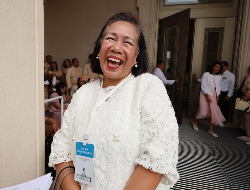 Marie Lou Fernandez Calpito laughs  before the Bacolod Philippines Temple dedication in Bacolod City, Philippines, on Sunday, May 31, 2026.