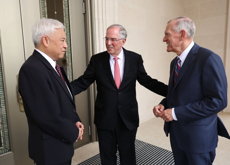Elder Neil L. Andersen of the Quorum of the Twelve Apostles, center, Elder Steven R. Bangerter, General Authority Seventy and executive director of the Temple Department, right,, and Elder Chi Hong (Sam) Wong, General Authority Seventy and first counselor in the Philippines Area presidency, talk at the Bacolod Philippines Temple in Bacolod City, Philippines, on Saturday, May 30, 2026.