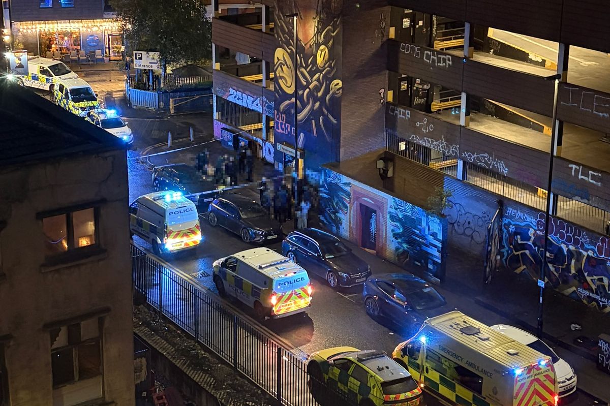 A cordon in place outside the car park