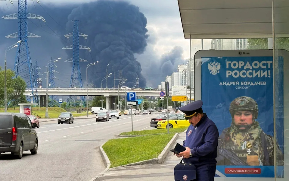 Black smoke rises in the aftermath of Ukrainian strikes on Moscow