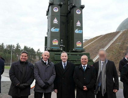 Israeli defense officials with their German counterparts, with the Arrow 3 system in the background. Credit: The Media and Public Affairs Bureau of the Israel Ministry of Defense Israeli defense officials with their German counterparts, with the Arrow 3 system in the background.