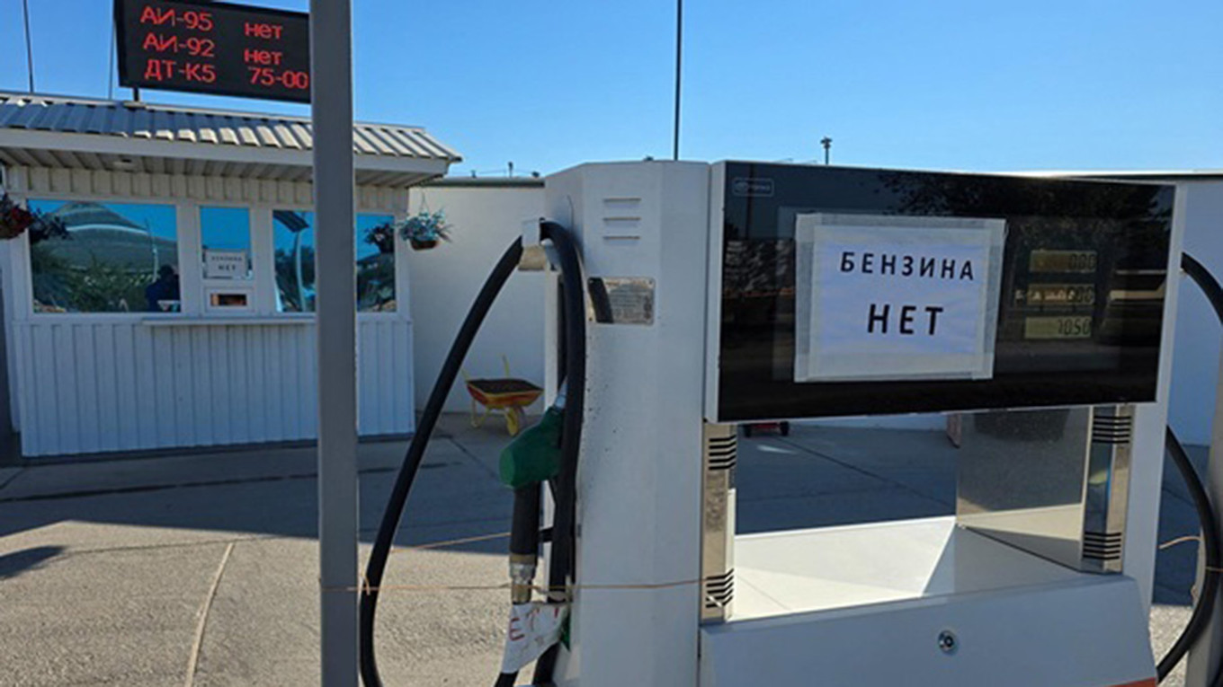 A sign at a gas station in annexed Crimea that reads: “Out of gasoline.”