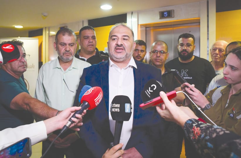 RA’AM PARTY head Mansour Abbas speaks after signing the coalition agreement in Ramat Gan last week.