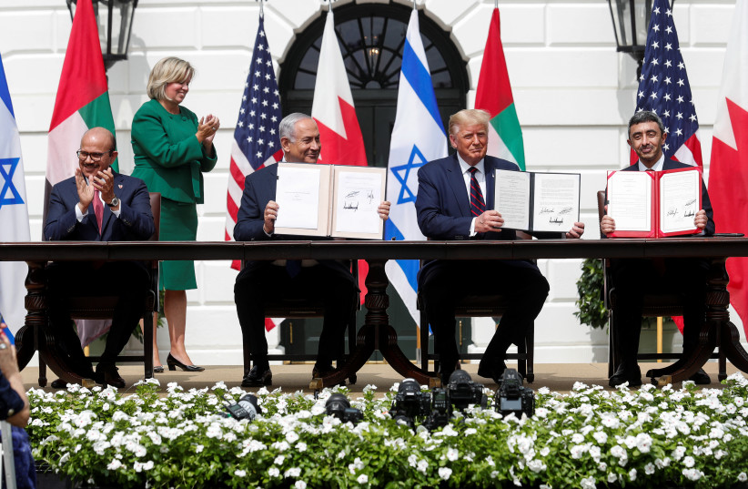 Bahrain’s Foreign Minister Abdullatif Al Zayani, Israel's Prime Minister Benjamin Netanyahu, US President Donald Trump and United Arab Emirates (UAE) Foreign Minister Abdullah bin Zayed participate in the signing of the Abraham Accords, normalizing relations between Israel and some of its Middle Eas