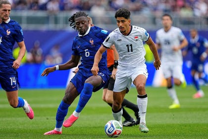 France's Manu Kone (6) and Iran's Ali Alipour (11) battle for the ball during the World Cup Group I soccer match between France and Iraq in Philadelphia, U.S., on Monday. Credit: Petr David Josek/AP France's Manu Kone (6) and Iran's Ali Alipour (11) battle for the ball during the World Cup Group I soccer match between France and Iraq in Philadelphia, U.S., on Monday.