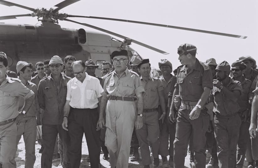 THEN-PRIME MINISTER Levi Eshkol (C), minister Menachem Begin (L) and Gen. Yeshayahu Gavish (R) visit reserve units in Sinai, June 13, 1967.