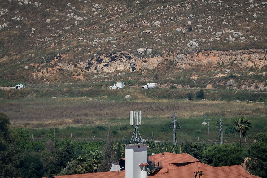 United Nations vehicles spotted lining up waiting to enter southern Lebanon.