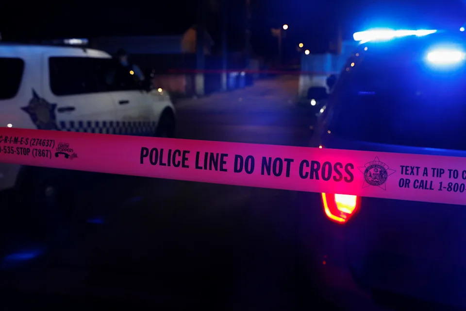 In this file photo, police tape marks the scene of a shooting on the South Side of Chicago, Illinois, U.S.