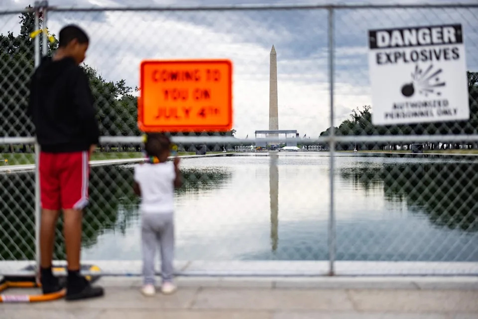 Trump claimed that the Reflecting Pool is back in working order, but fencing still blocks the public from the grounds (Getty)