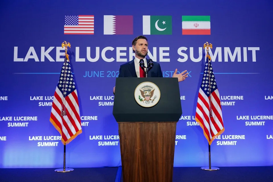 Nathan Howard/Reuters - PHOTO: Vice President JD Vance speaks to members of the media before boarding Air Force Two, after the U.S. and Iran held high-level talks at the Lake Lucerne Summit, at Emmen Military Air Base, Emmen, Switzerland, June 22, 2026.