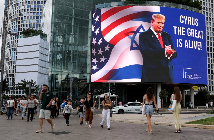 A billboard displays a picture of U.S. President Donald Trump, amid a ceasefire between Israel and Hamas in Gaza, in Tel Aviv, Israel, October 12, 2025