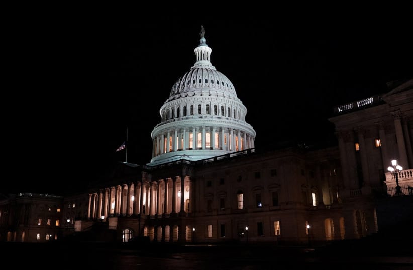 The US Capitol building is illuminated the night the Senate passed a short-term government funding bill, more than a month into the longest US government shutdown, on Capitol Hill in Washington, D.C., U.S., November 10, 2025.