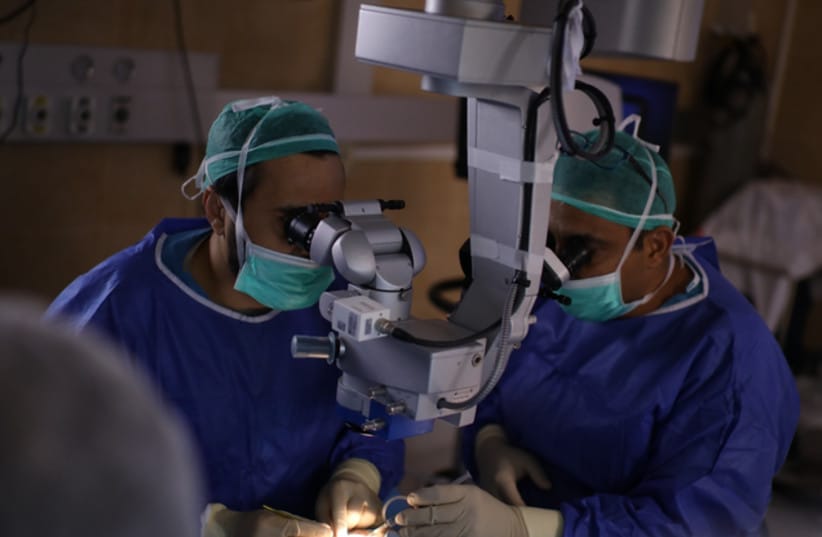 The surgery team working on the implant at Rambam Hospital in Haifa.