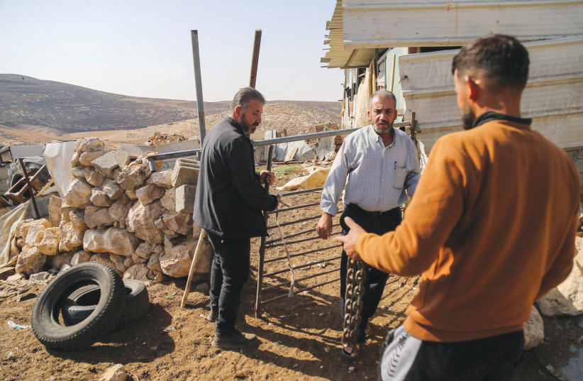 Palestinians inspect livestock damage after settlers were said to have attacked, stealing 40 sheep in Al-Dhahiriya village, south of Hebron, this past week. We must take responsibility and put an end to it, says the writer.