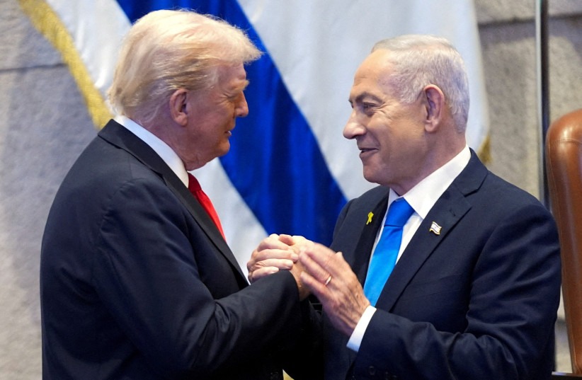 PRIME MINISTER Benjamin Netanyahu and US President Donald Trump share a warm moment in the Knesset in October 2025.